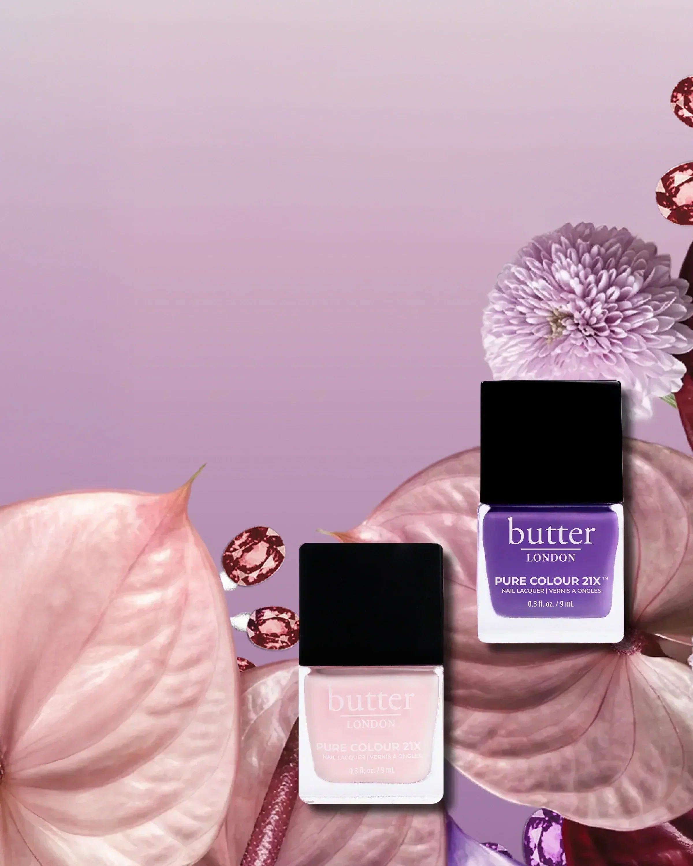 Butter London purple nail polish bottle with a large pink flower backdrop against a pastel pink background.