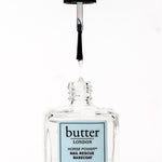 Butter London Horse Power Nail Rescue Basecoat bottle with brush poised above the opening