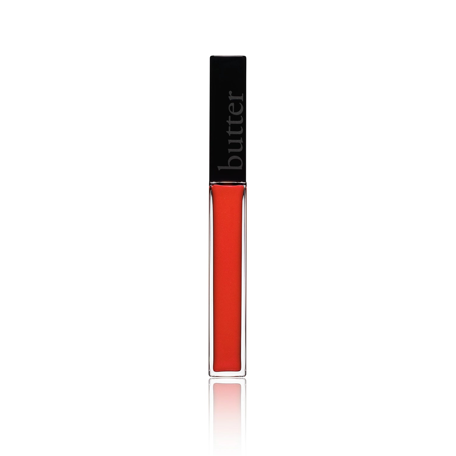 Lip gloss tube with black cap and bright orange red gloss