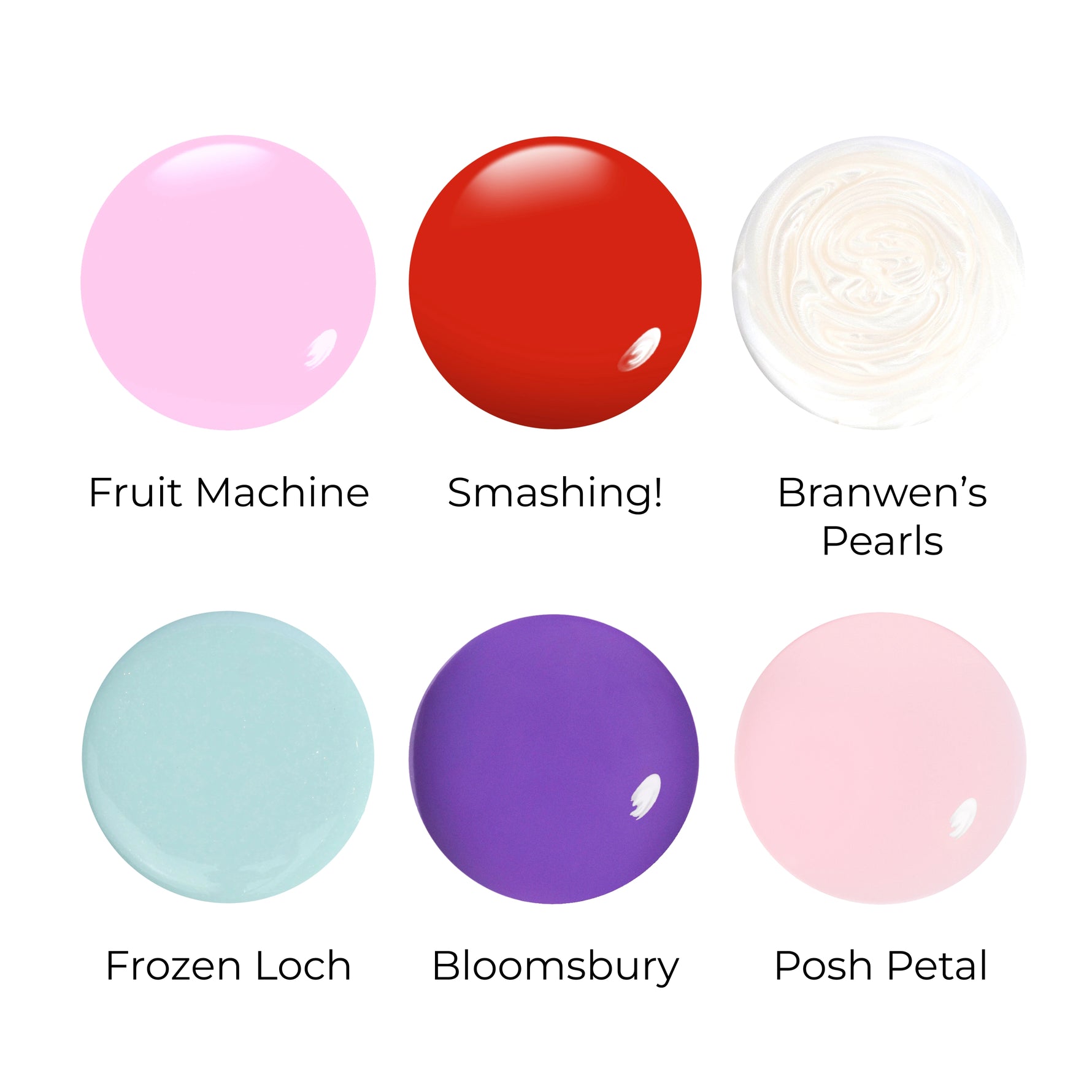 Six circular swatches from the Spring Candy nail lacquer set in pink red pearlescent white mint purple and pale pink