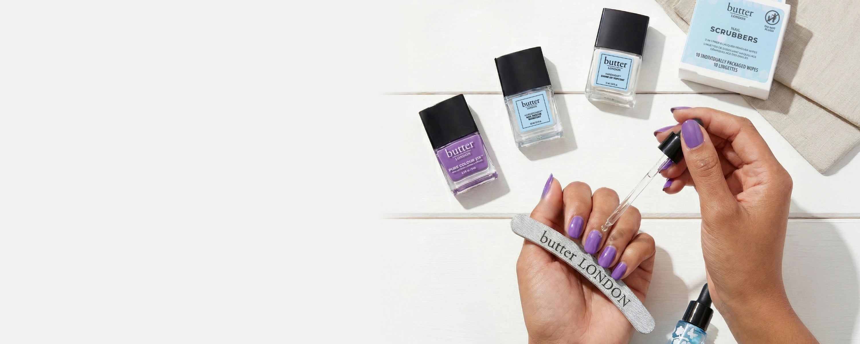 Spring Nail Hack - 20% Off Nail Hack Systems: Nail Hack System laying on white wood panels