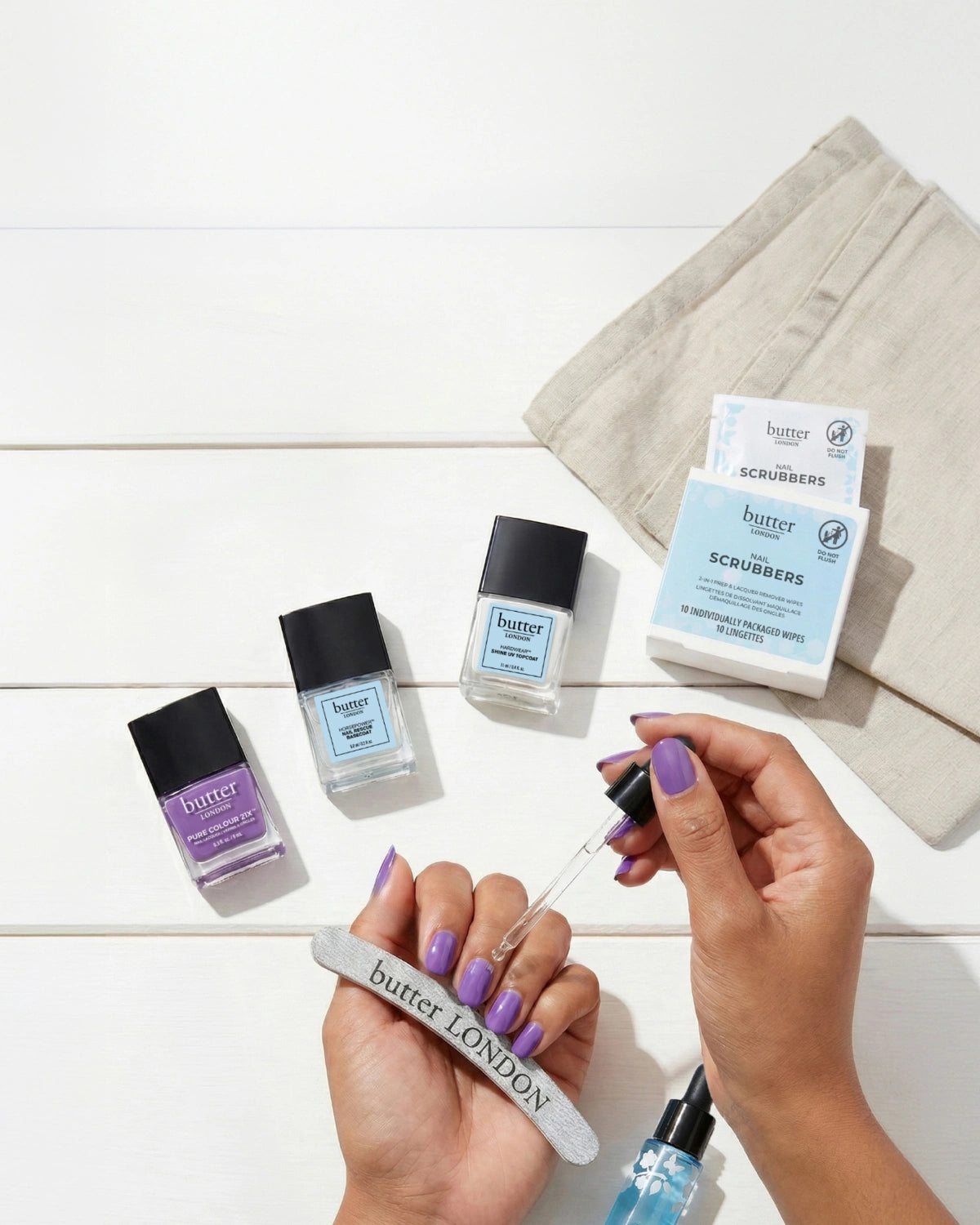 Spring Nail Hack - 20% Off Nail Hack Systems: Nail Hack System laying on white wood panels