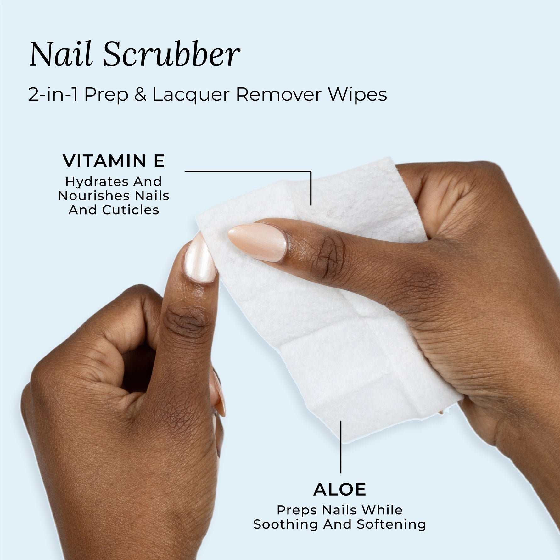 Butter LONDON Nail Scrubbers - Hand using a nail scrubber wipe with text highlighting vitamin E and aloe benefits on a light blue background.